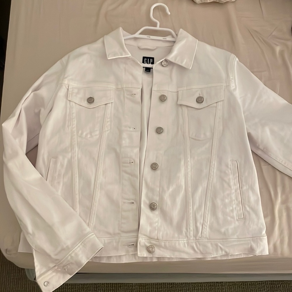 Selling white GAP jean jacket .